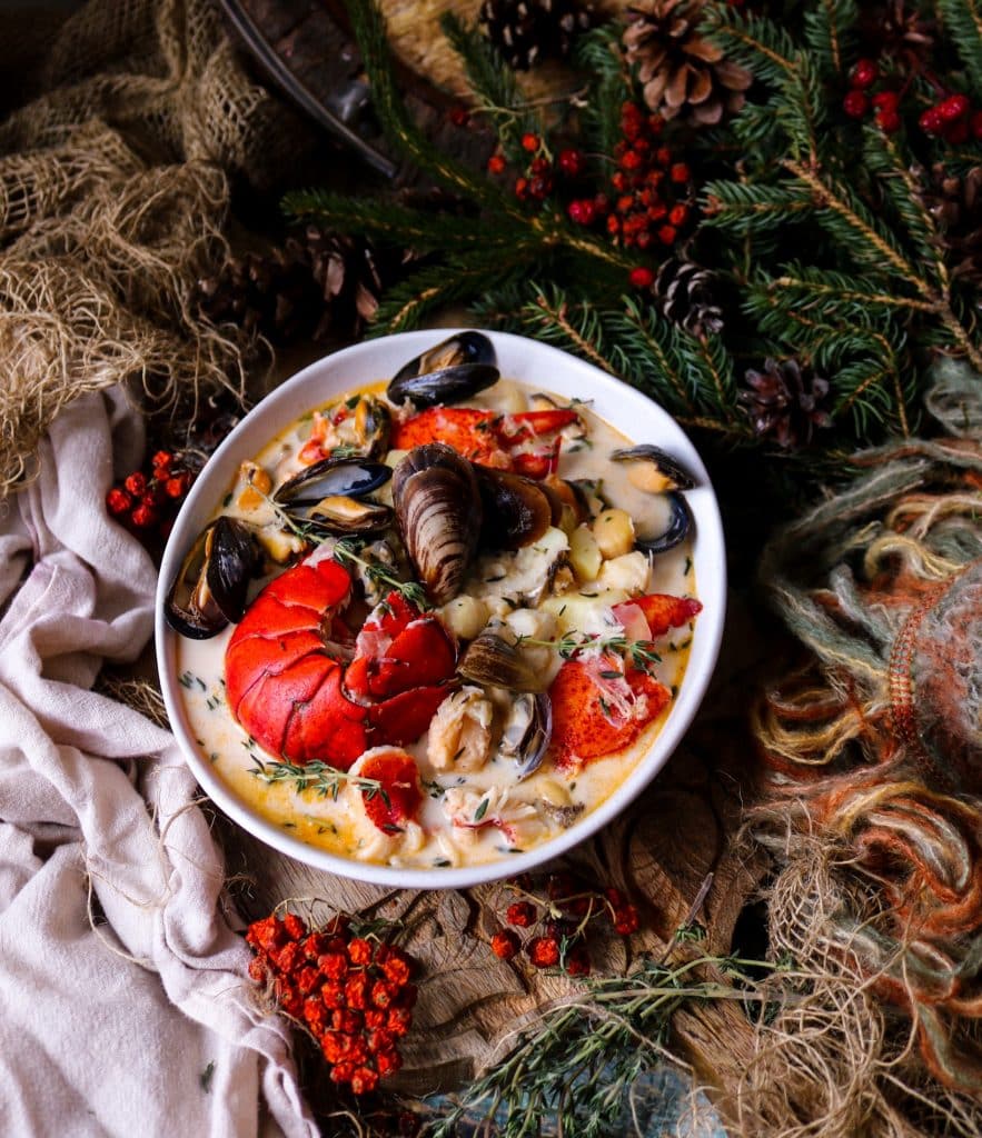 Canadian seafood chowder with lobster, mussels, and potatoes.