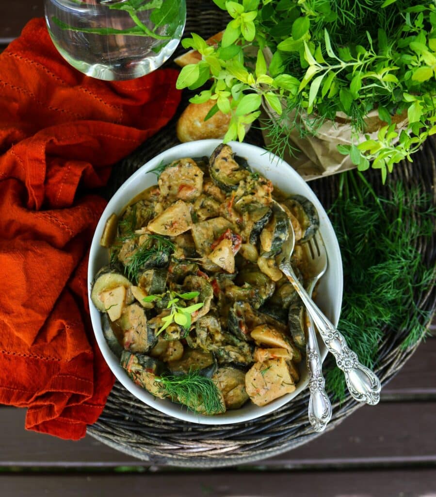 Summer vegetable stew with zucchini, potatoes, and dill.