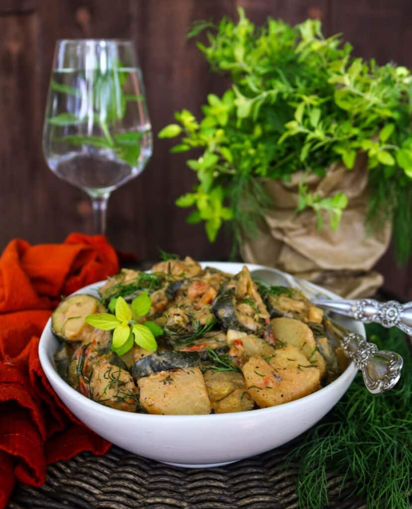 Vegetarian zucchini and potato stew with fresh herbs