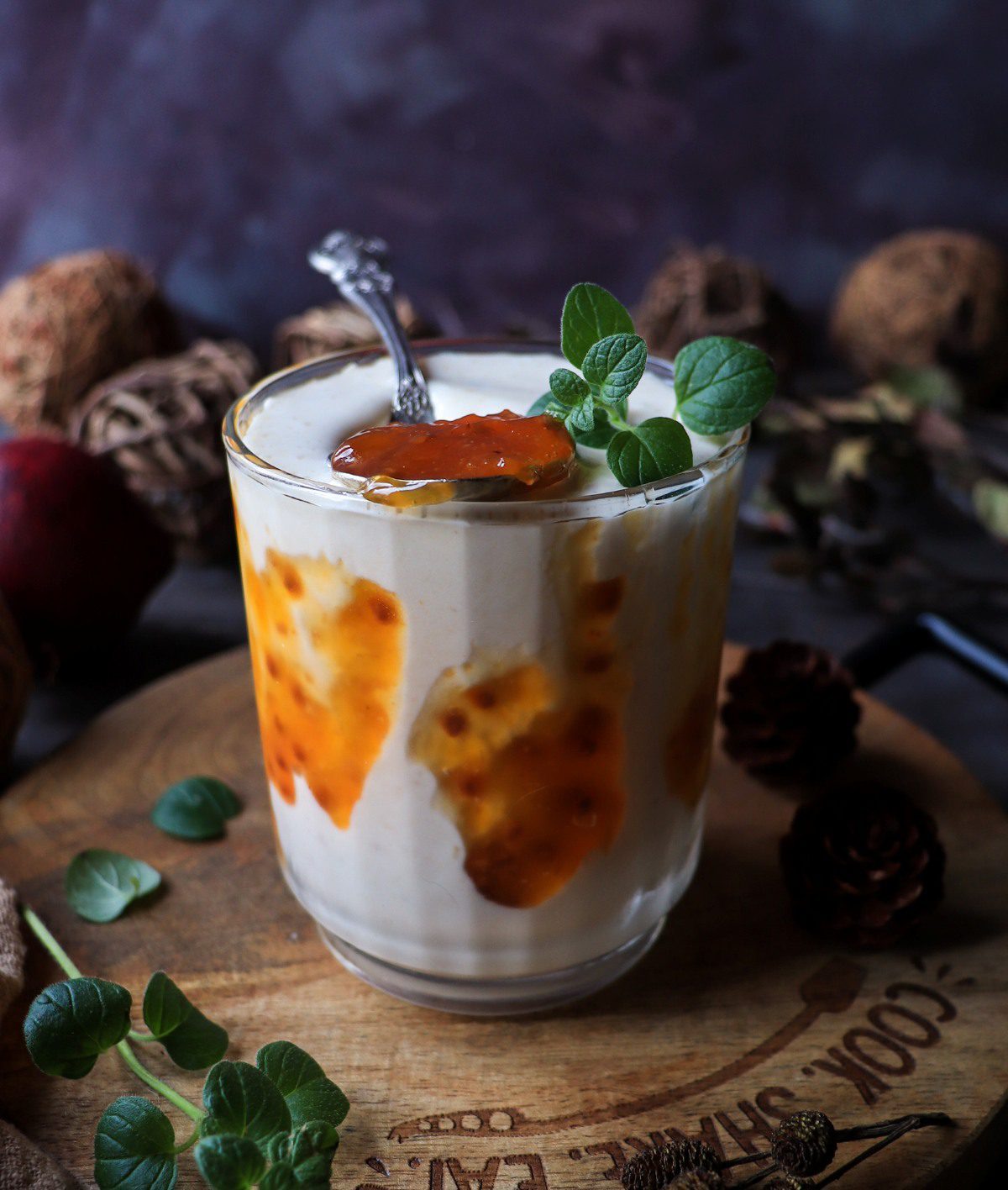Creamy cloudberry milkshake with cloudberry jam and brandy, served in a glass with rich vanilla base.