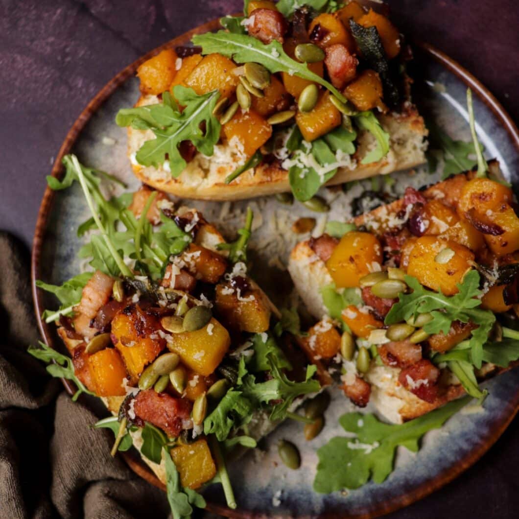 Roasted Butternut Squash Bruschetta with Ham, Sage, and Goat Cheese
