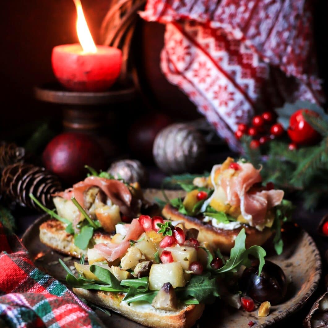 Festive Pear Chestnut Bruschetta with Prosciutto and Pomegranate