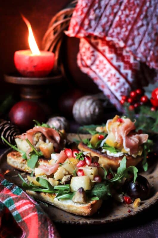 Festive Pear Chestnut Bruschetta with Prosciutto and Pomegranate