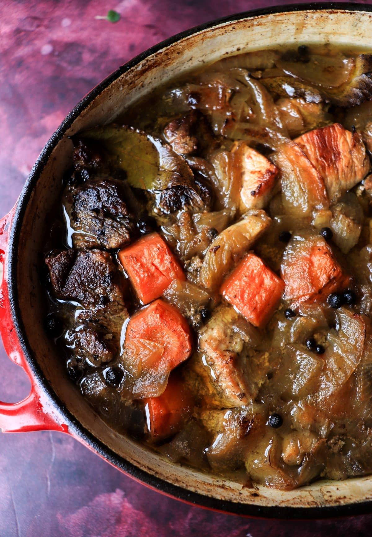 Karjalanpaisti (Karelian hot pot), a traditional Finnish beef and pork stew with carrots and onions, slow-braised in the oven.