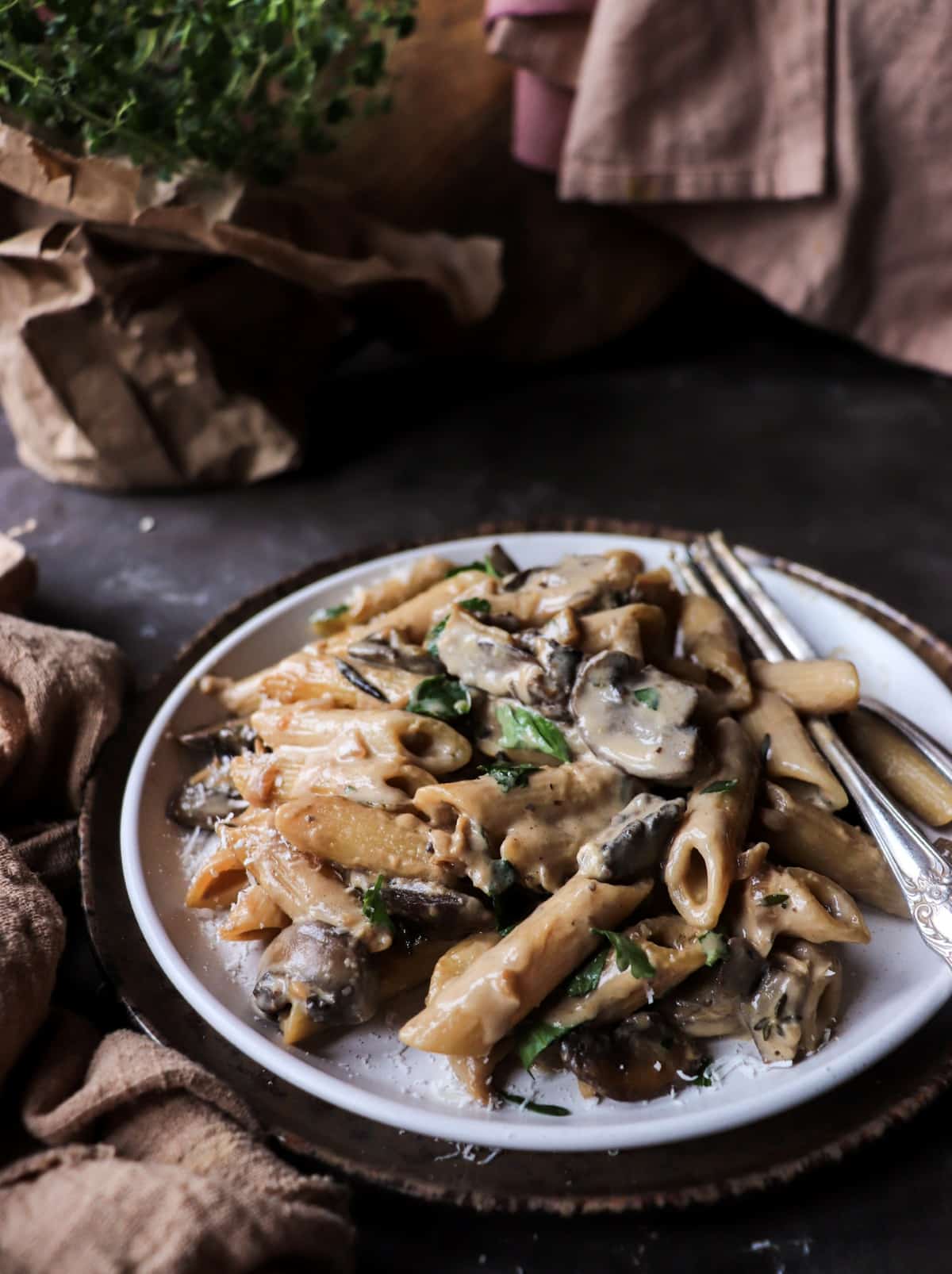 Creamy Marsala mushroom pasta with garlic, thyme, and Parmesan cheese.