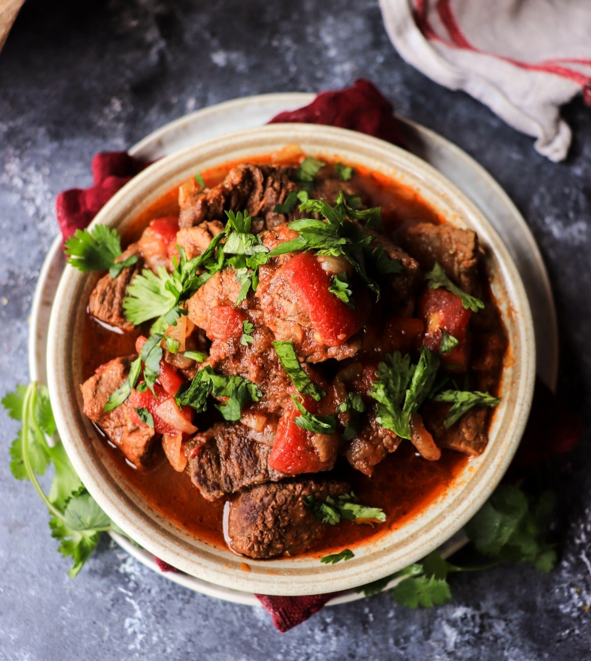 Tender braised beef in rich tomato sauce – Georgian Chashushuli recipe.