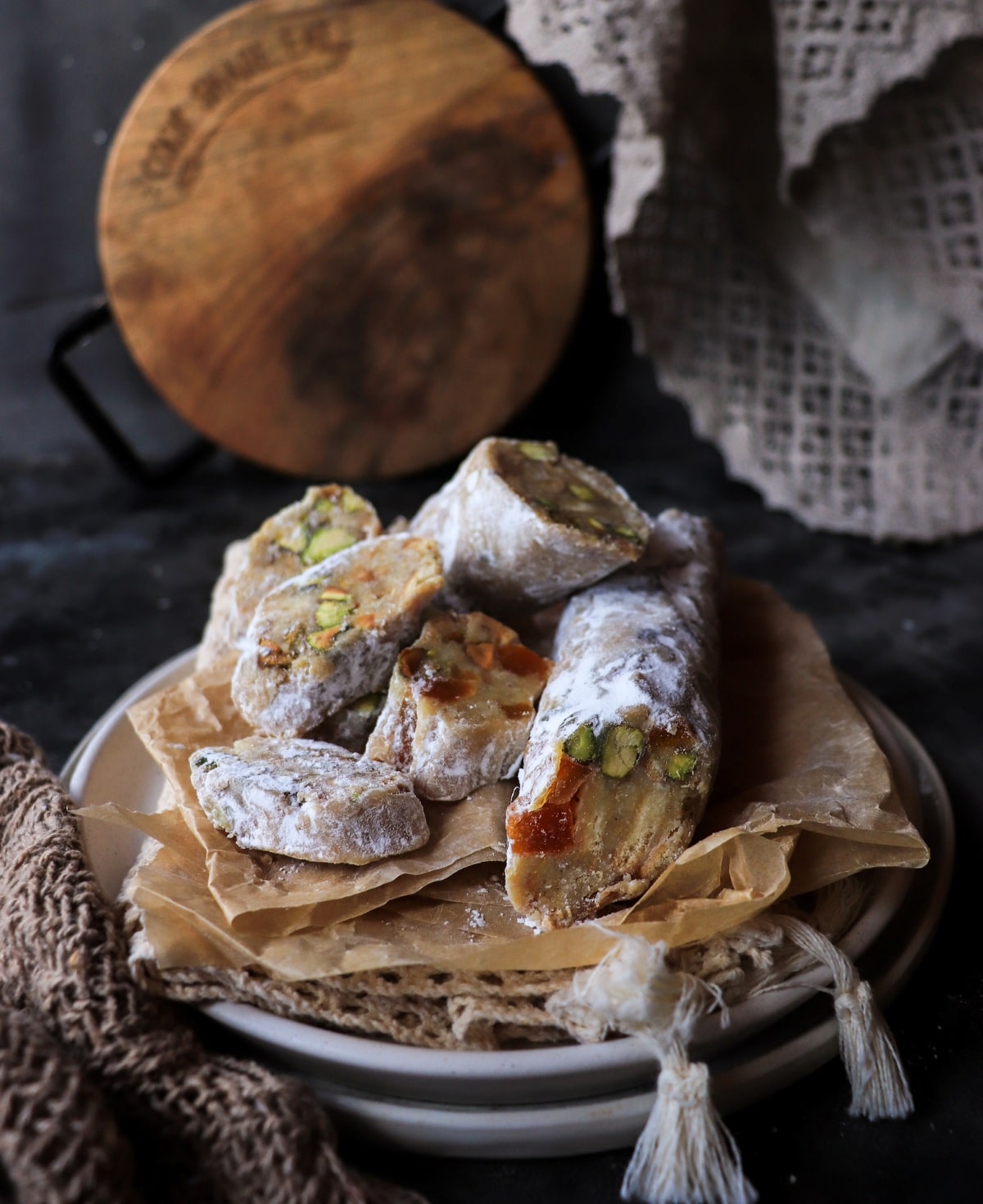 homemade white chocolate salami with pistachios and apricots rustic style