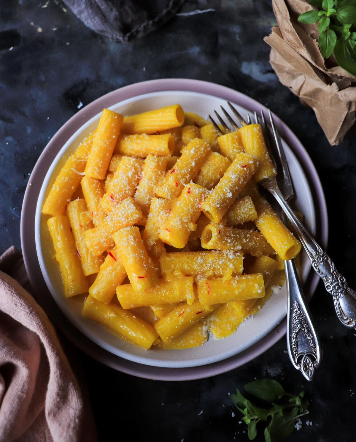 Italian Saffron Pasta (Pasta allo Zafferano) with rigatoni, Parmigiano, and glossy saffron butter sauce.