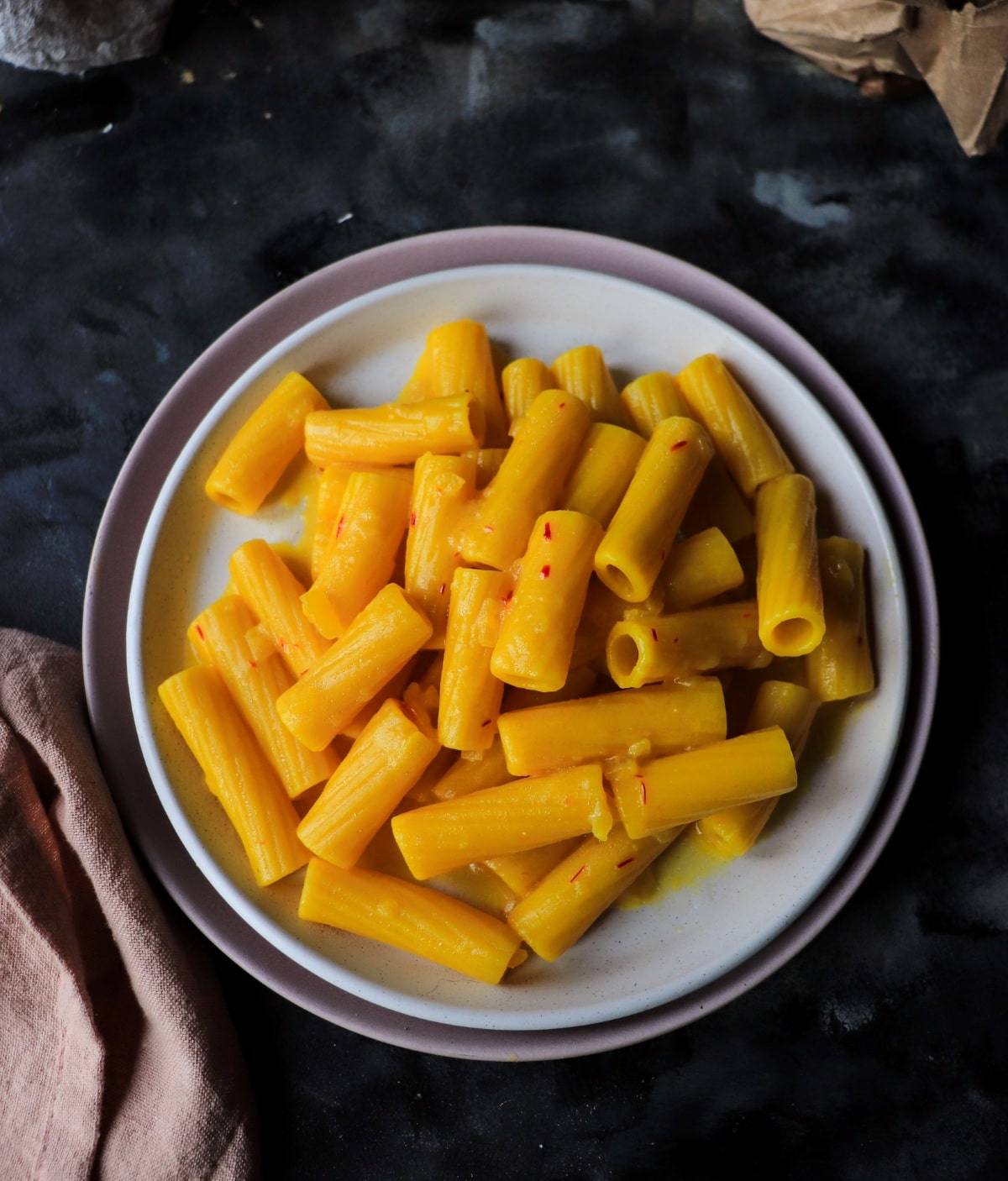 Italian Saffron Pasta (Pasta allo Zafferano) with rigatoni, Parmigiano, and glossy saffron butter sauce.