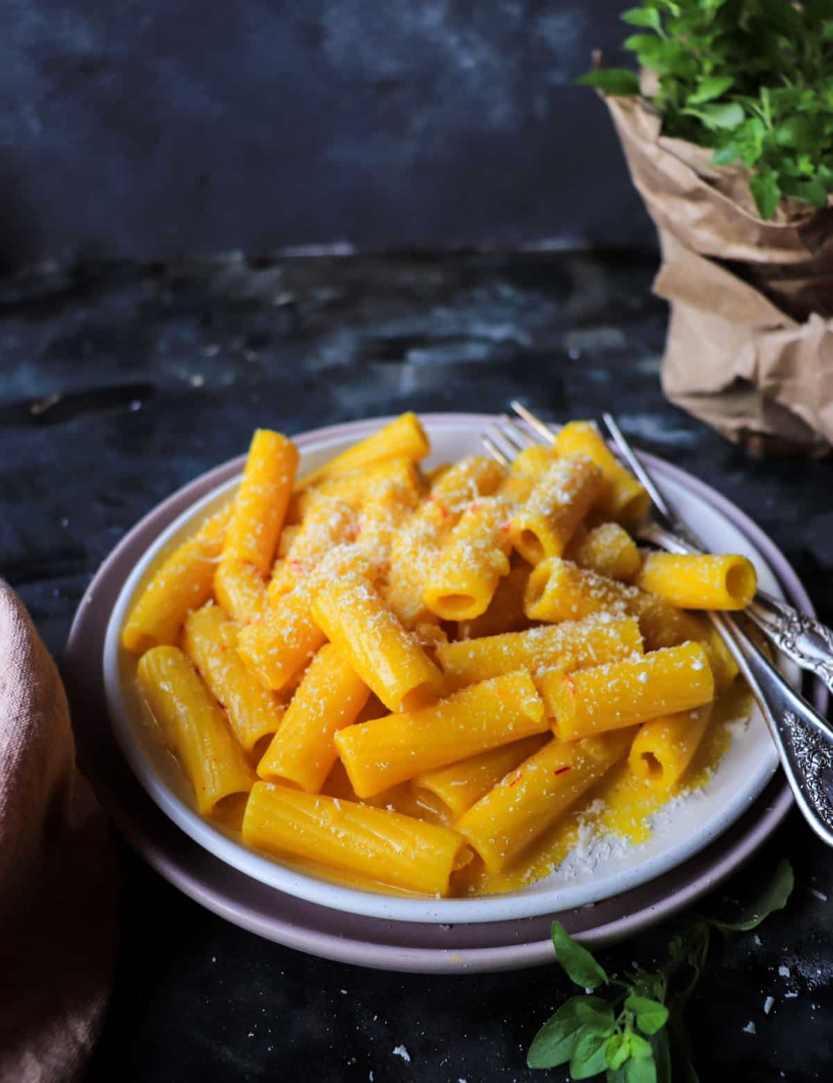 Italian Saffron Pasta (Pasta allo Zafferano) with rigatoni, Parmigiano, and glossy saffron butter sauce.