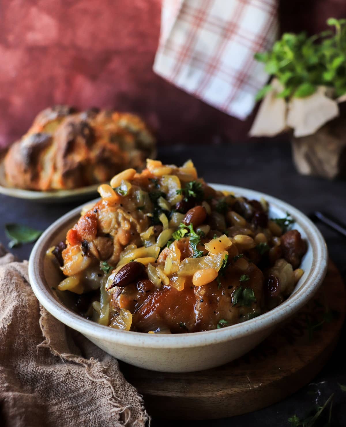 Pollo in Agrodolce – Italian sweet and sour chicken with glossy agrodolce sauce, raisins, and pine nuts.