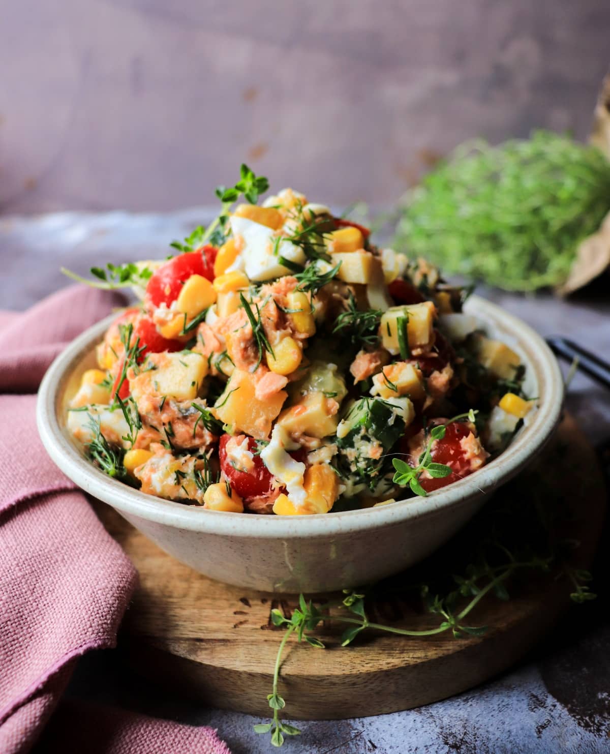 healthy salmon egg salad with cucumber corn and tomatoes