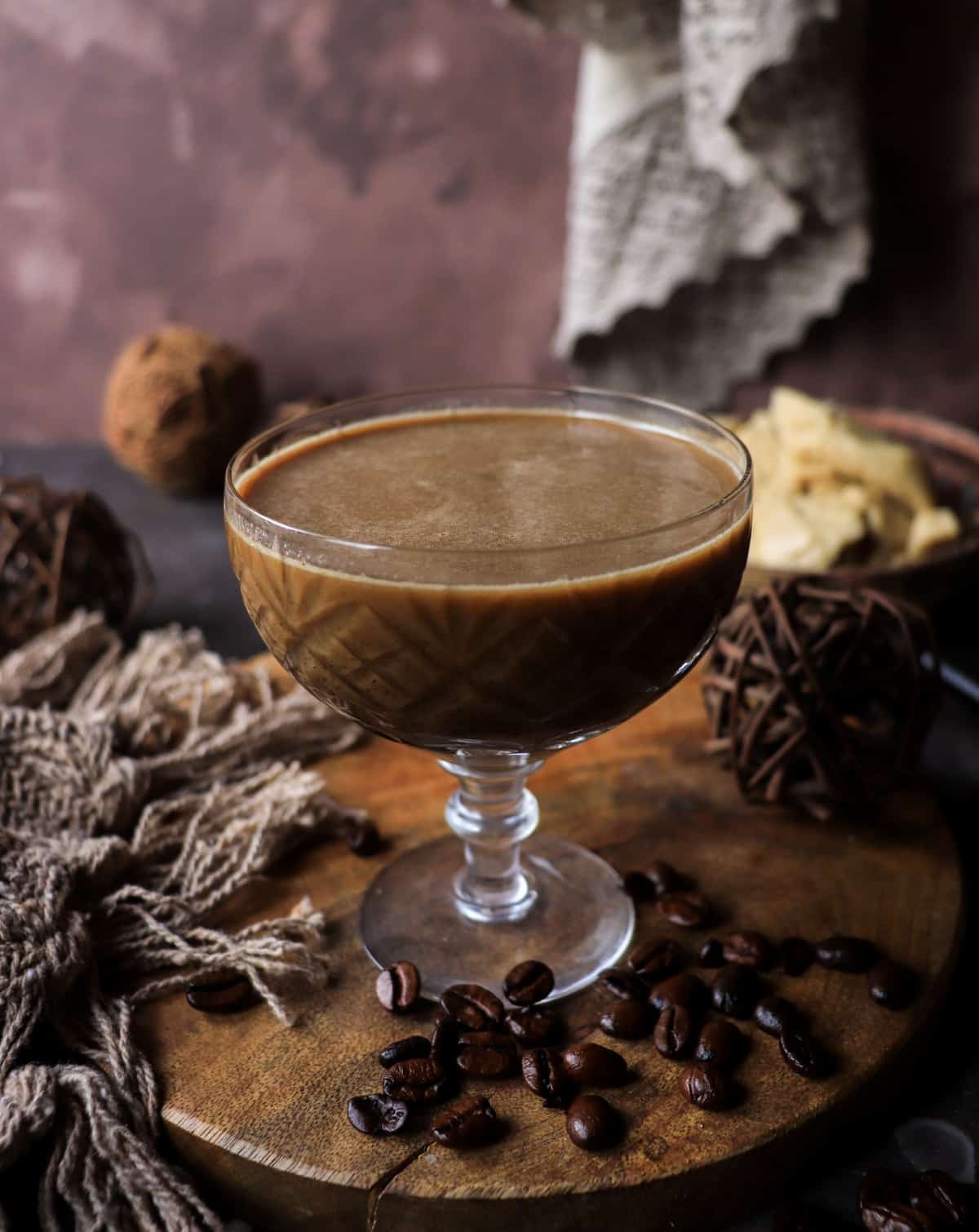 Espresso halva cocktail with Kahlua and coffee beans, a smooth dessert drink.