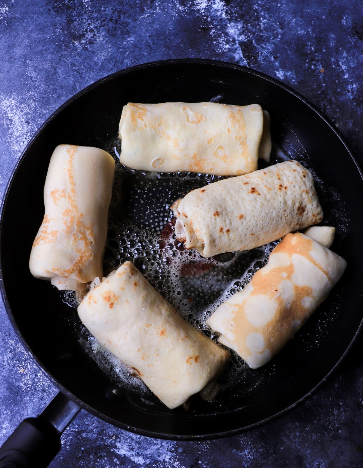 pan-frying cottage cheese filled crepes