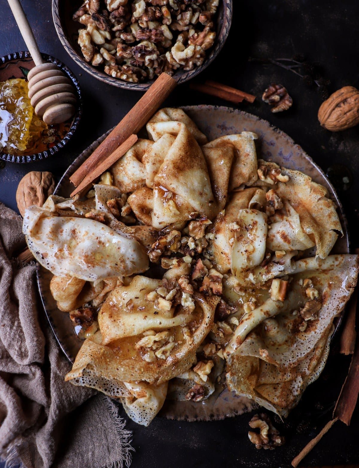 crepes topped with honey and walnuts simple serving idea