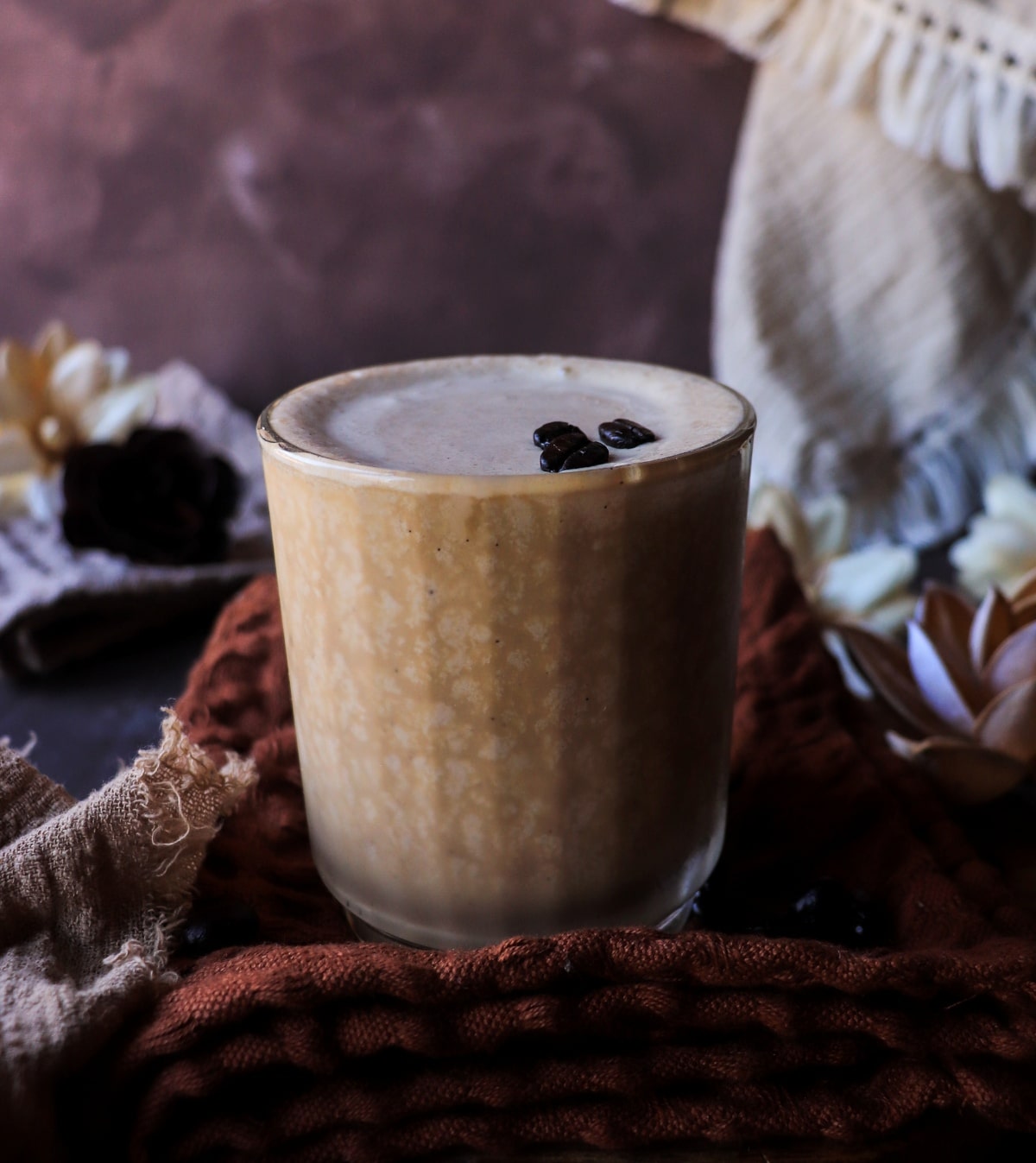 Easy boozy dessert drink made with ice cream and Kahlua in a simple glass.