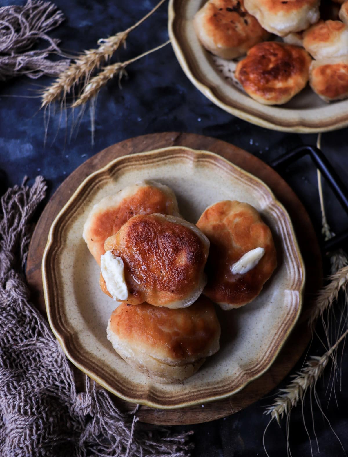 Classic Atlantic Canada fried bread with dark molasses drizzle and butter.