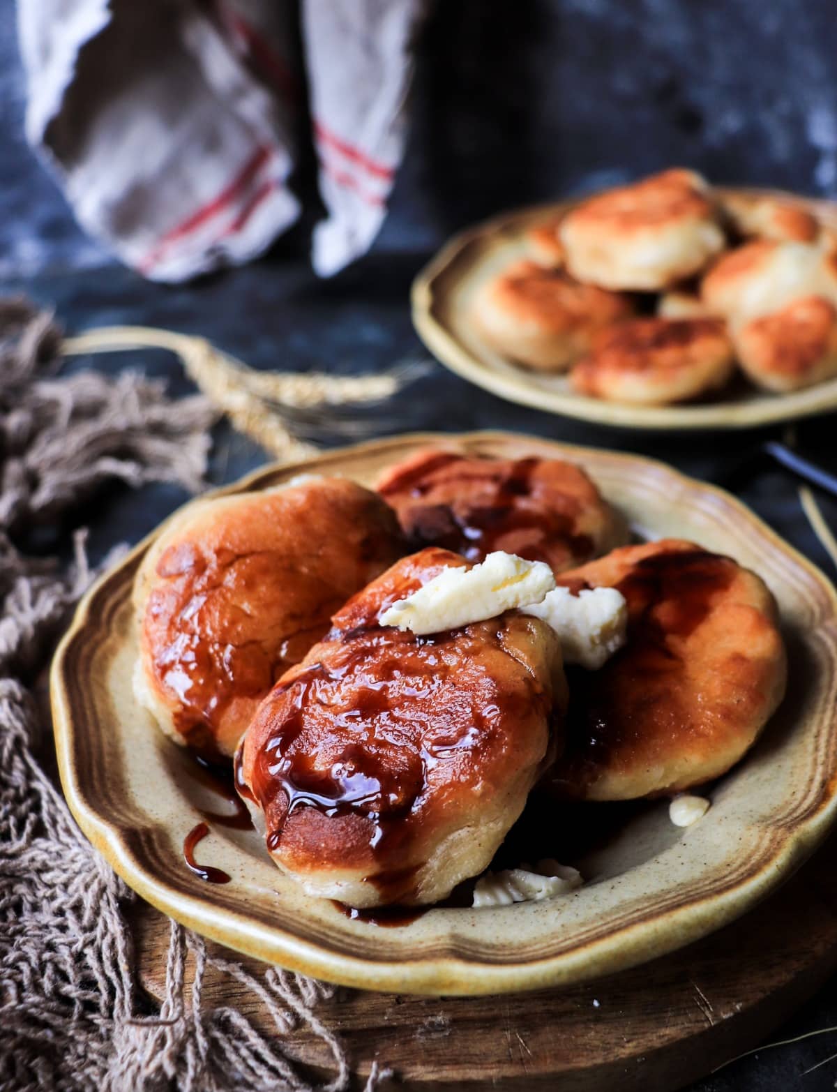 Classic Newfoundland toutons with melted butter and dark molasses.