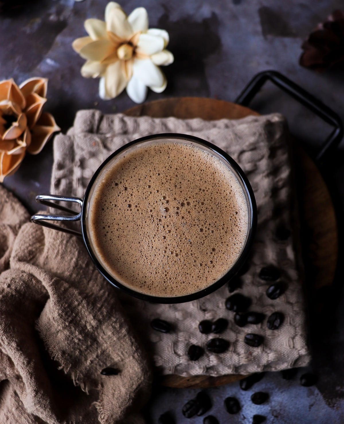 Nutella coffee with Kahlua viewed from above, showing smooth, creamy foam and rich chocolate coffee texture.