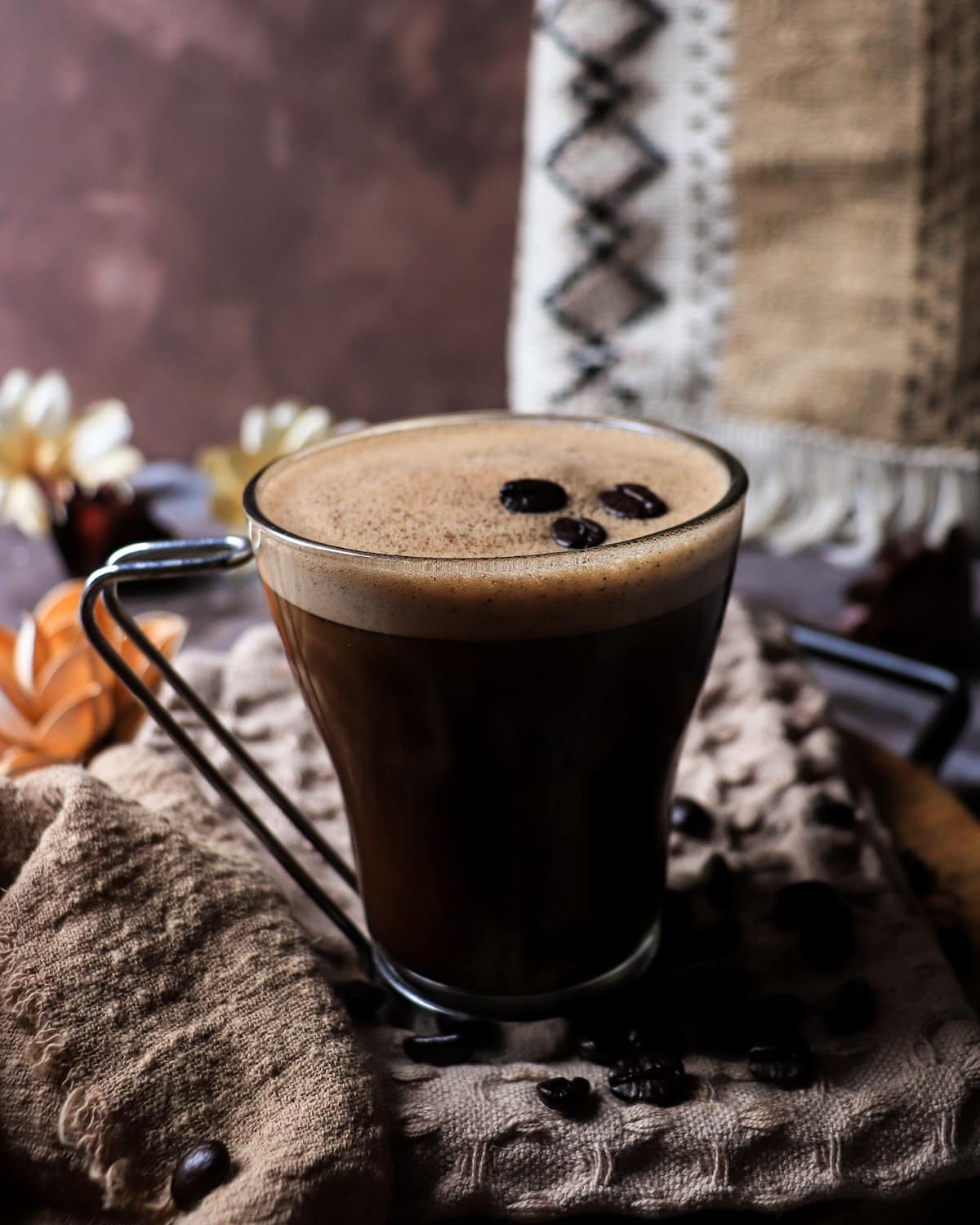 Rich chocolate Nutella coffee with Kahlua, featuring a silky texture and light foam in a cozy setting.