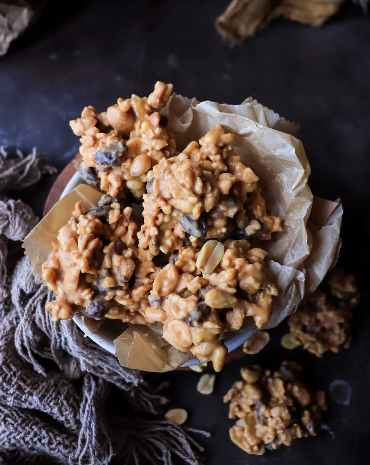 Butterscotch peanut clusters with cornflakes arranged in a bowl