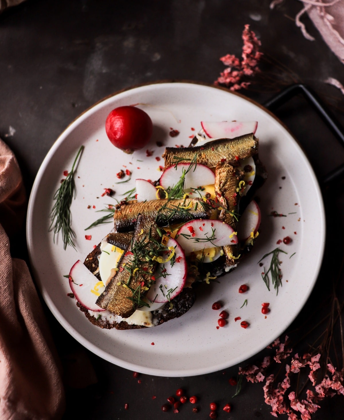 Smoked Baltic Sprats on Buttered Rye with Egg and Dill