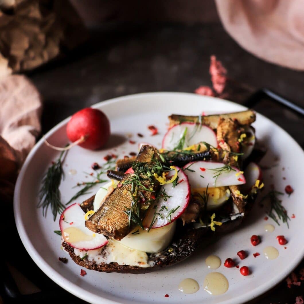 Smoked Baltic Sprats on Buttered Rye with Egg and Dill