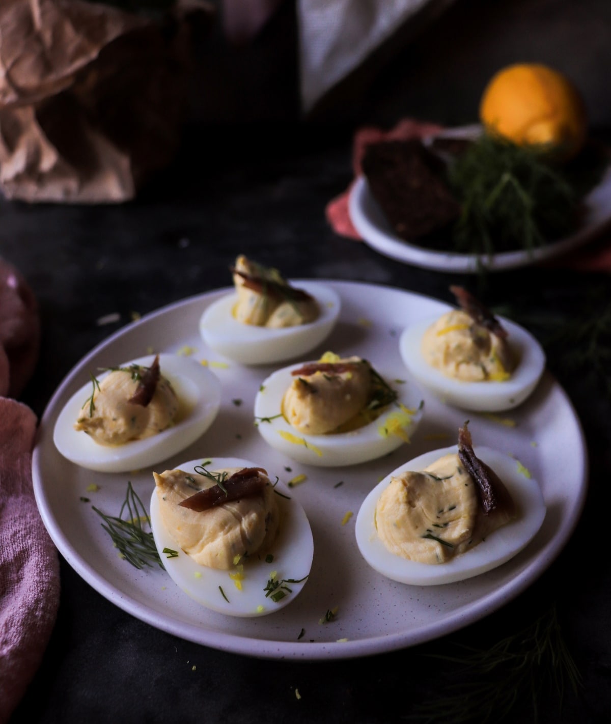 Anchovy deviled eggs with dill and lemon zest
