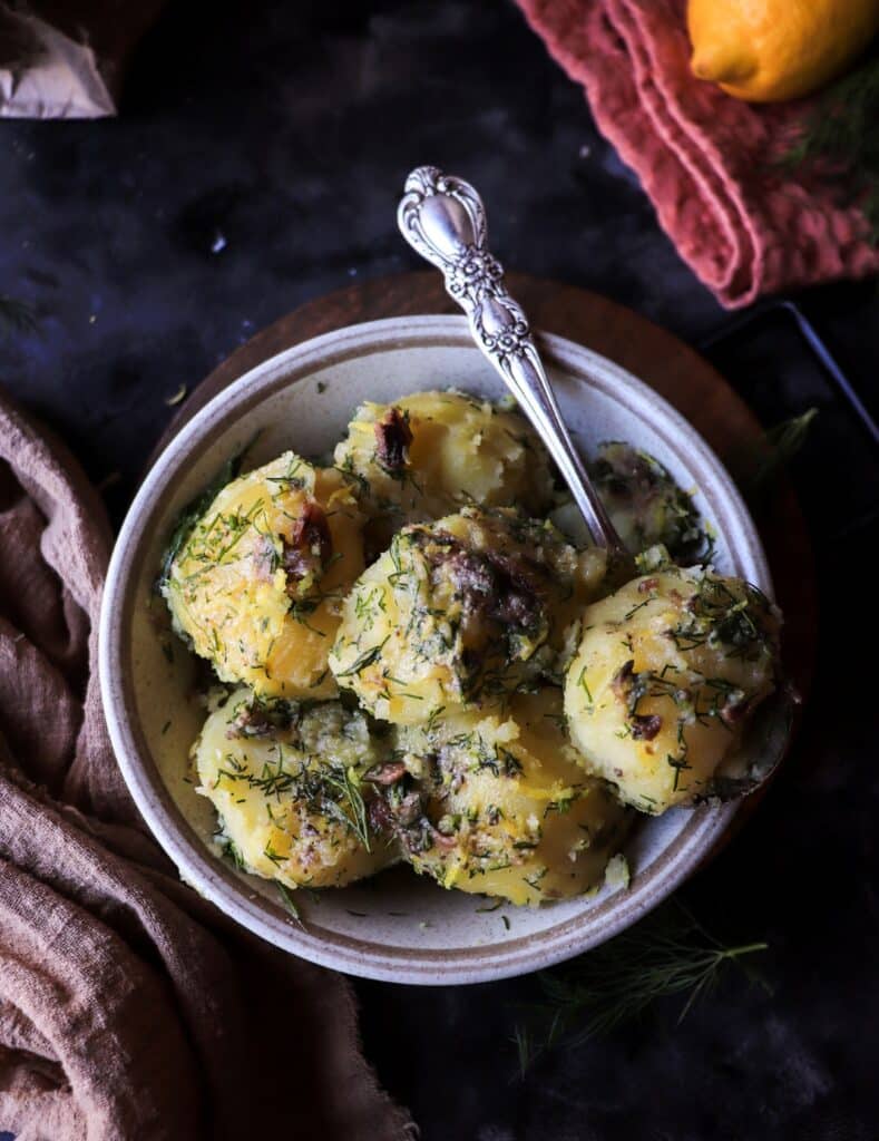 Rustic potato side dish with dill and anchovy butter