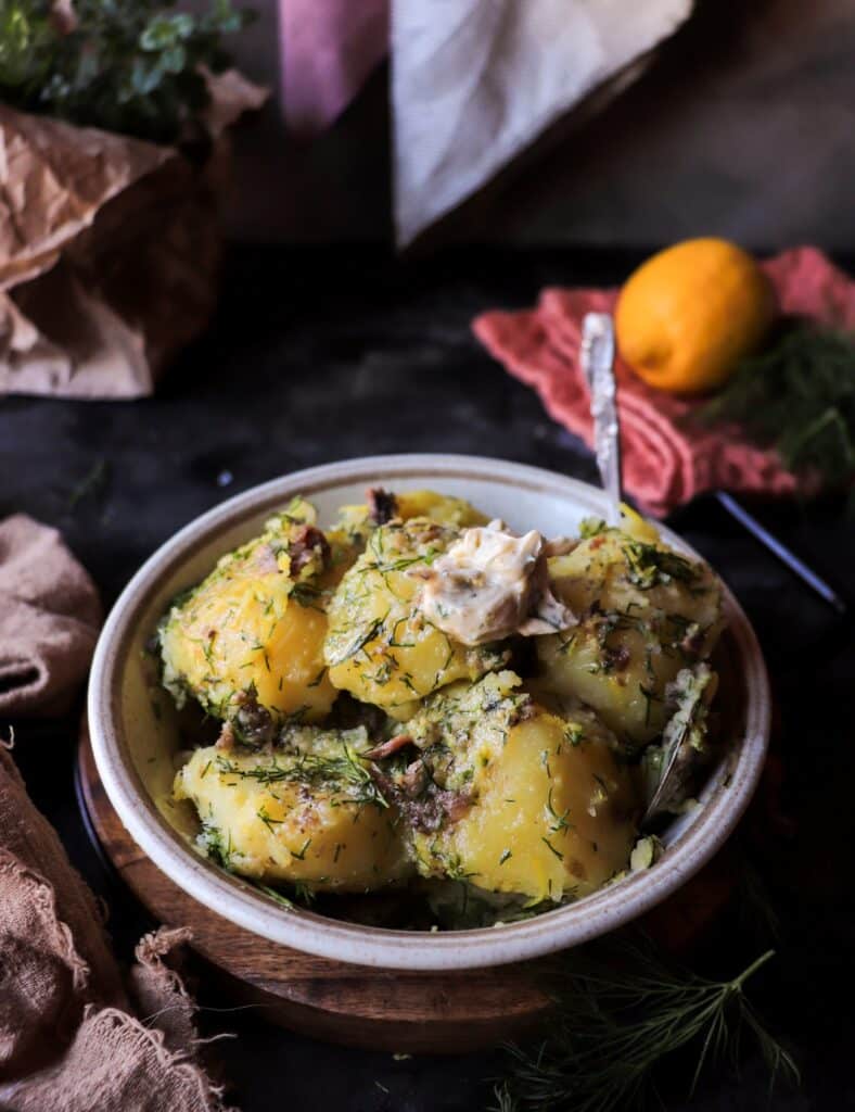 Rustic potatoes with melting anchovy herb butter