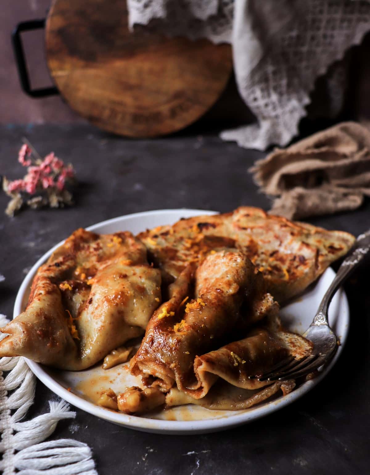 butter fried crêpe parcels with dulce de leche and caramel sauce
