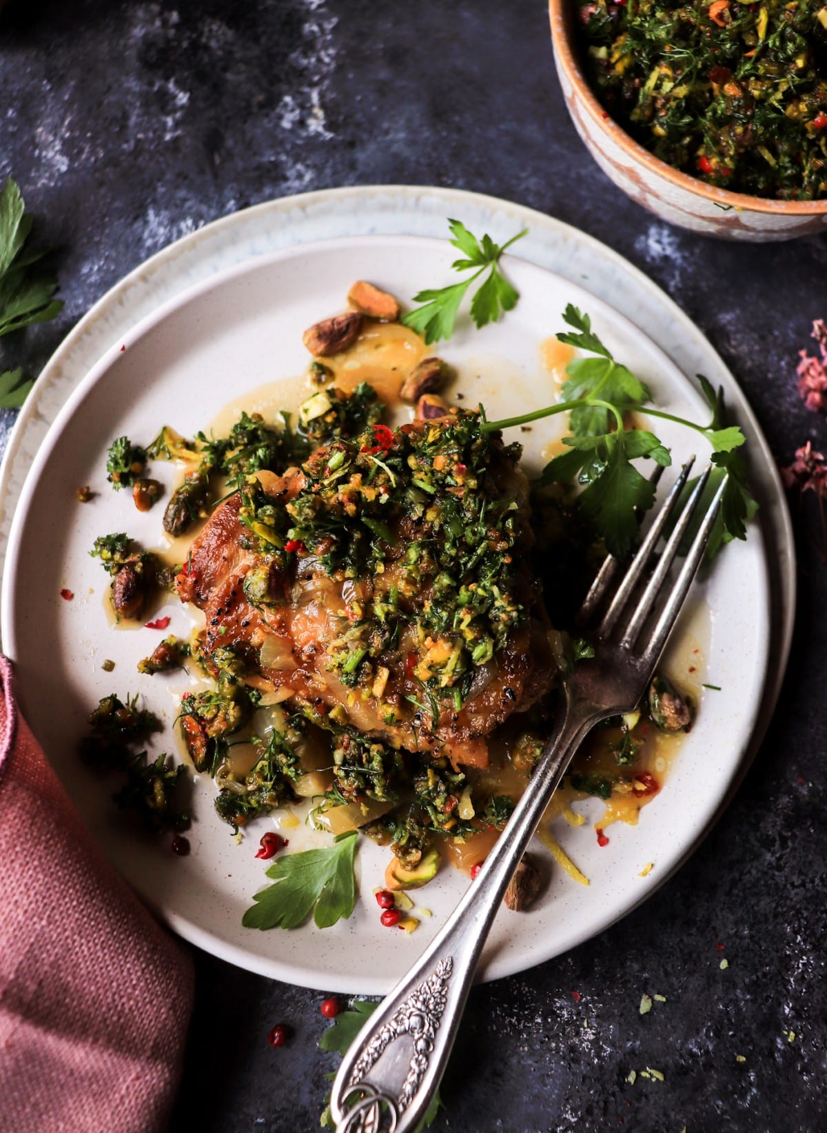 Braised chicken with chunky pistachio gremolata and shallots