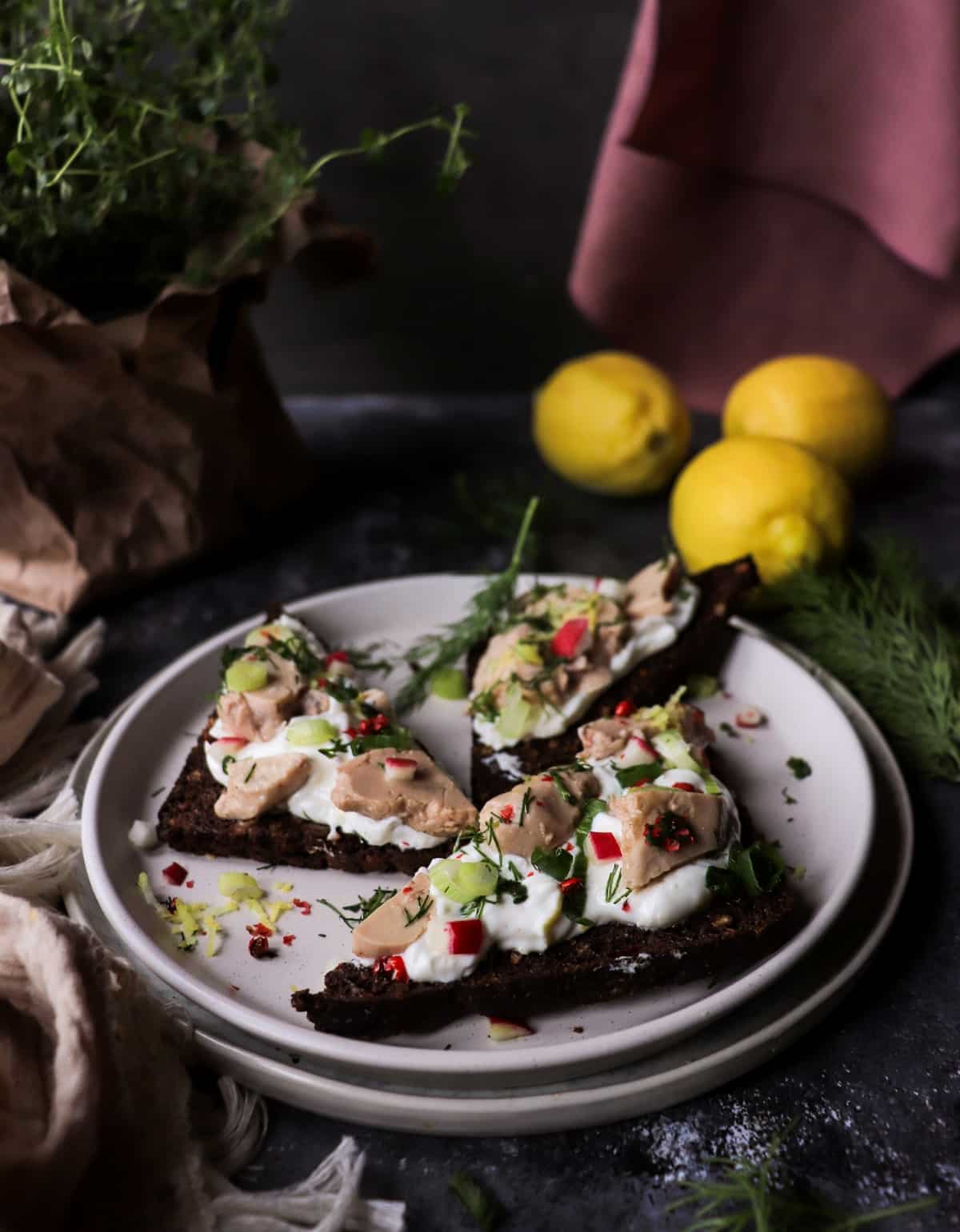 Nordic cod liver on rye toast with fresh dill and lemon zest