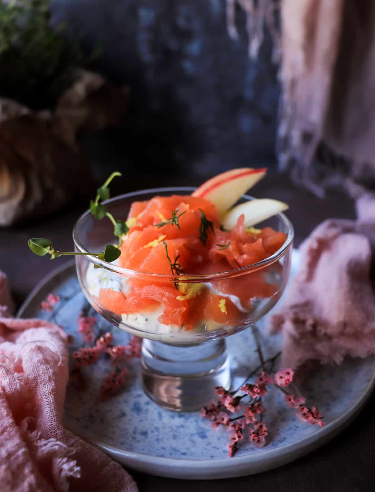 Horseradish smoked salmon verrine with apple, dill, and creamy horseradish sauce in elegant appetizer glasses