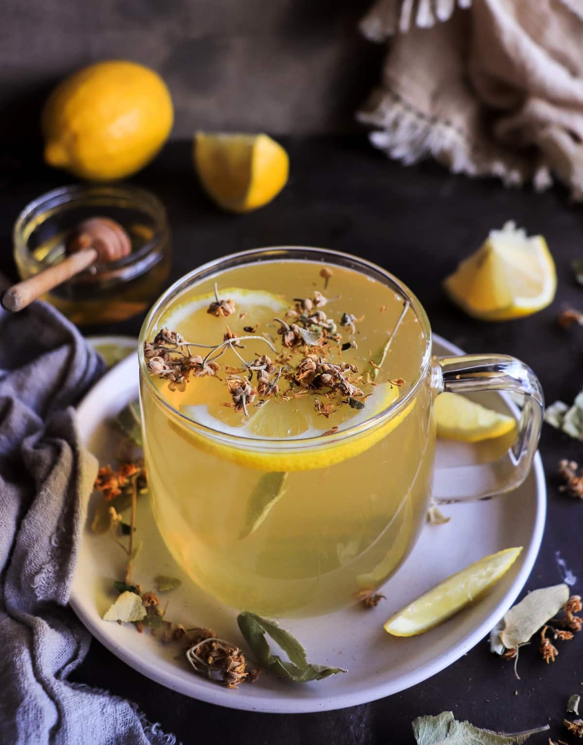 Linden flower tea made with dried linden blossoms, lemon, and honey
