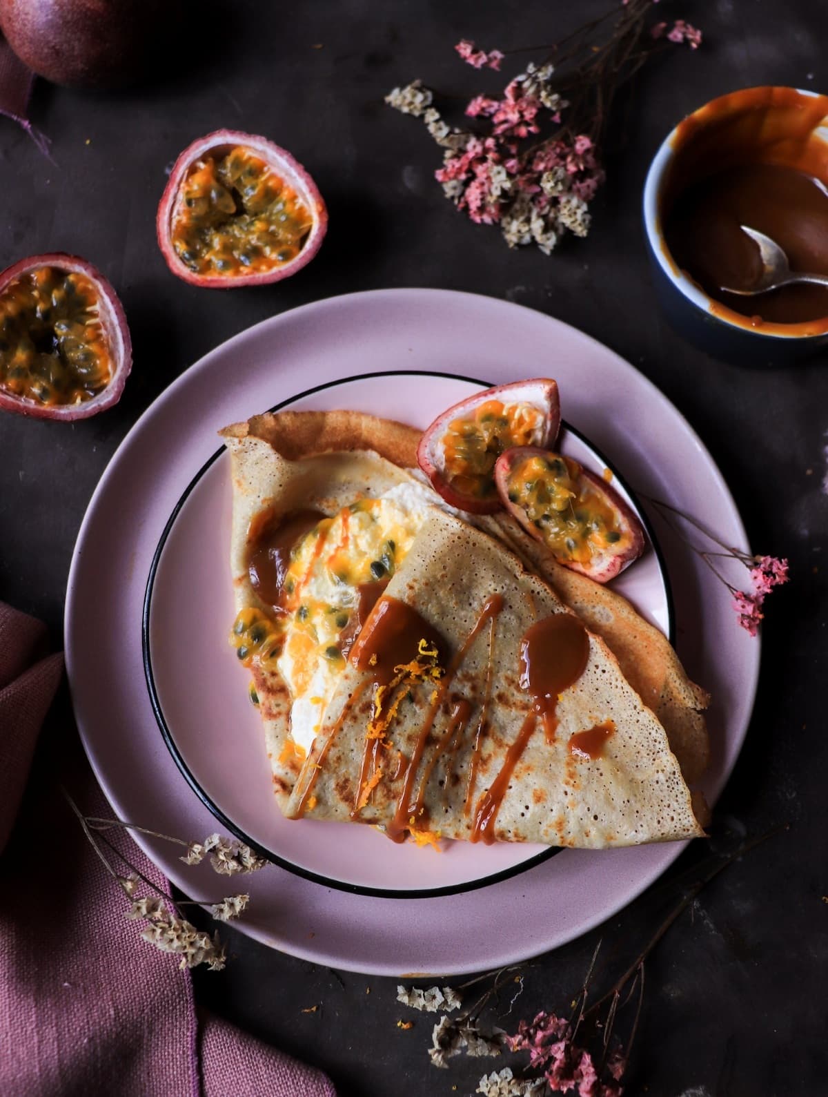 Ricotta crêpes with passion fruit and dulce de leche.
