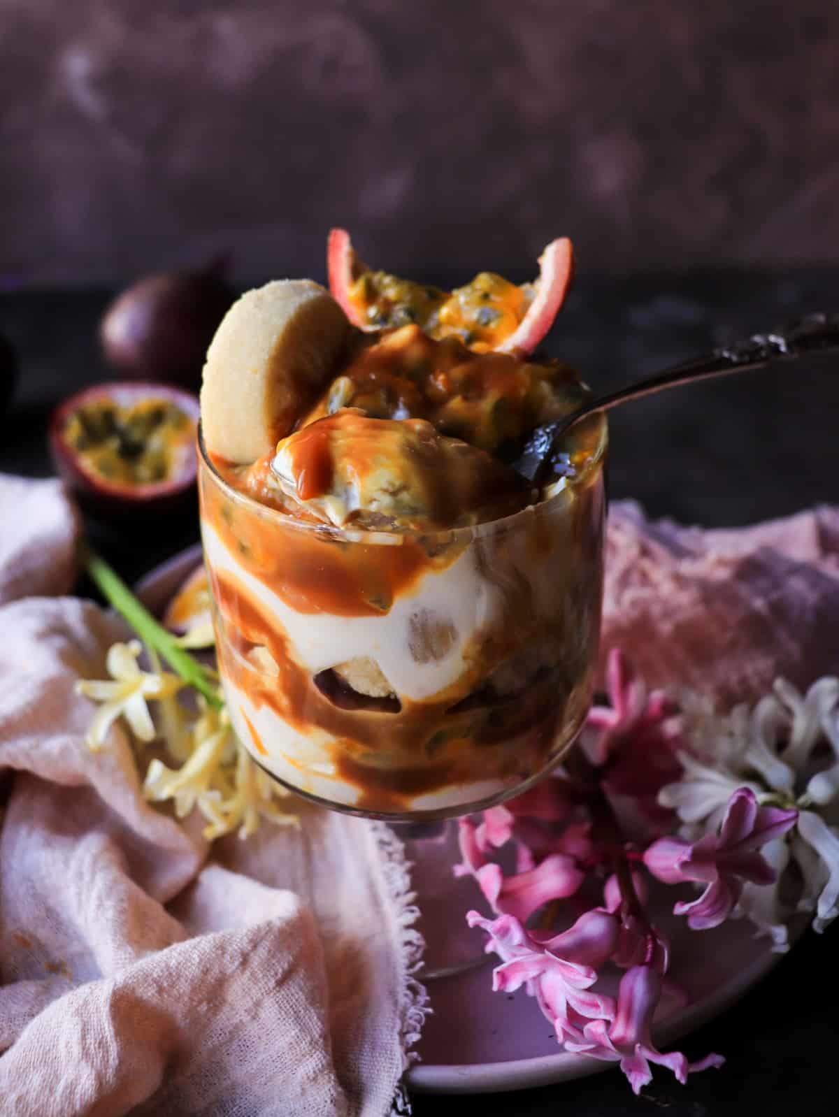 Easy no-bake Passion Fruit Dulce de Leche Trifle with mascarpone, sable cookies, and fresh passion fruit.