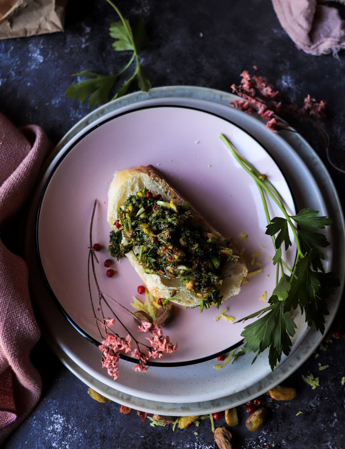 Crostini topped with pistachio gremolata
