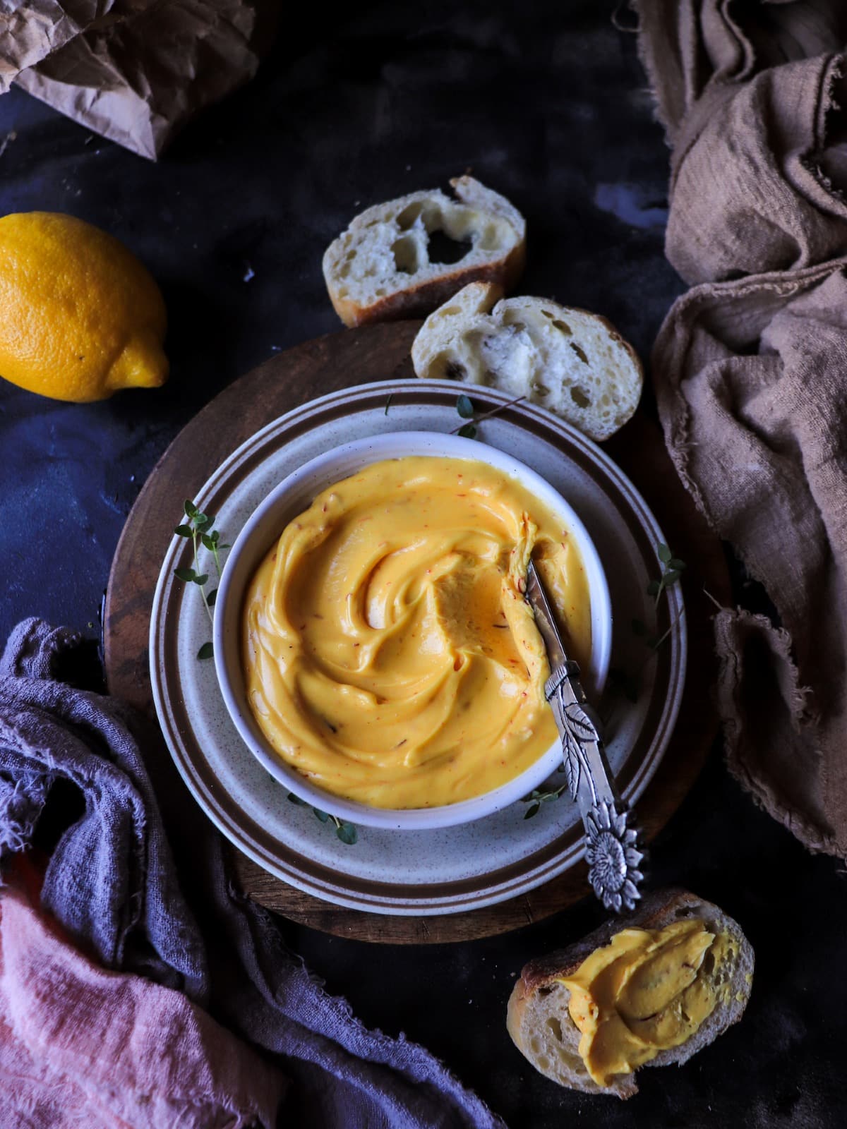 saffron compound butter served with sliced bread