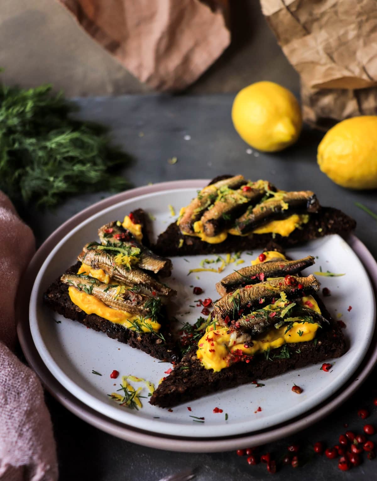 Smoked Sprats on Rye Toast with Saffron Yolk Mousse