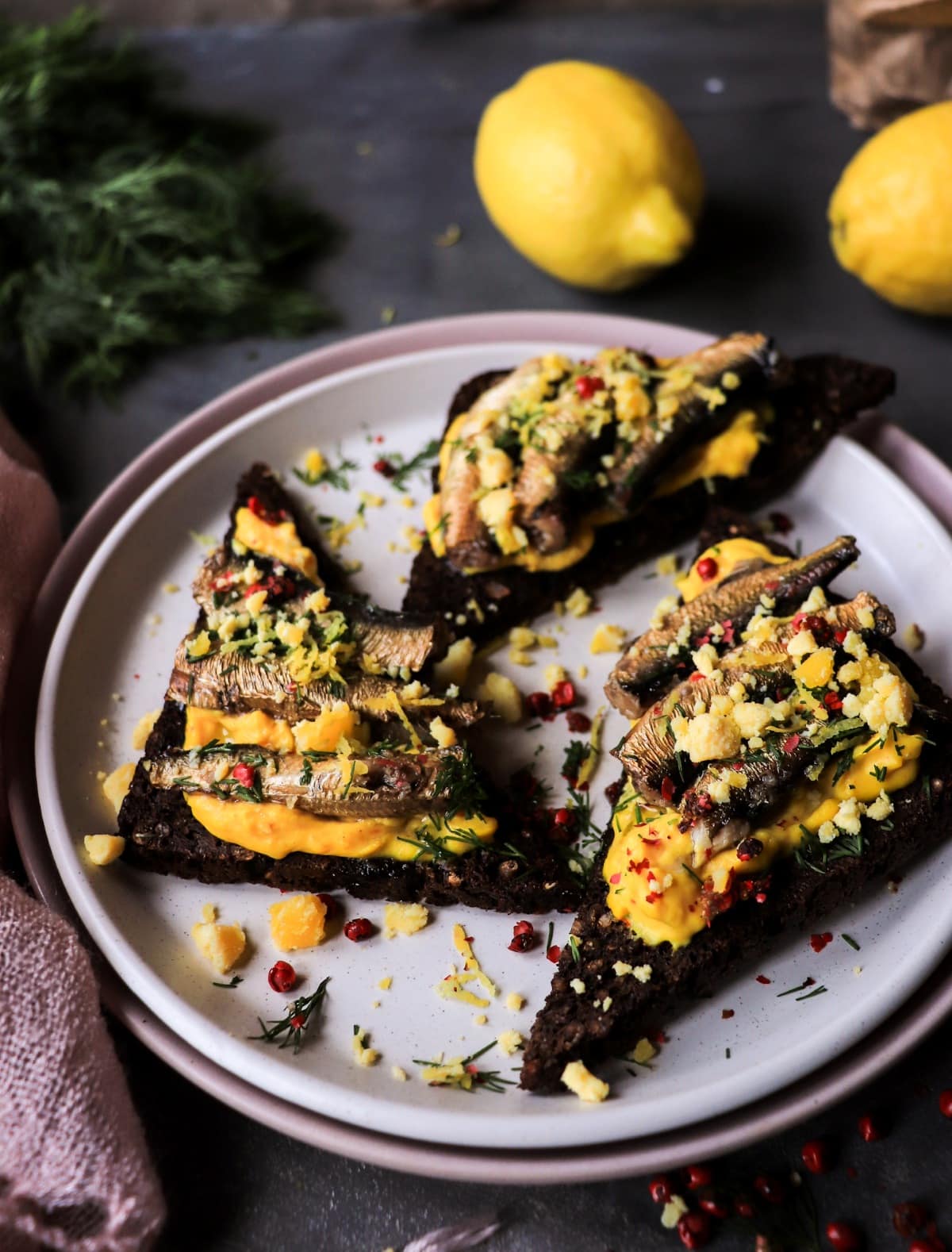 Smoked Sprats on Rye Toast with Saffron Yolk Mousse