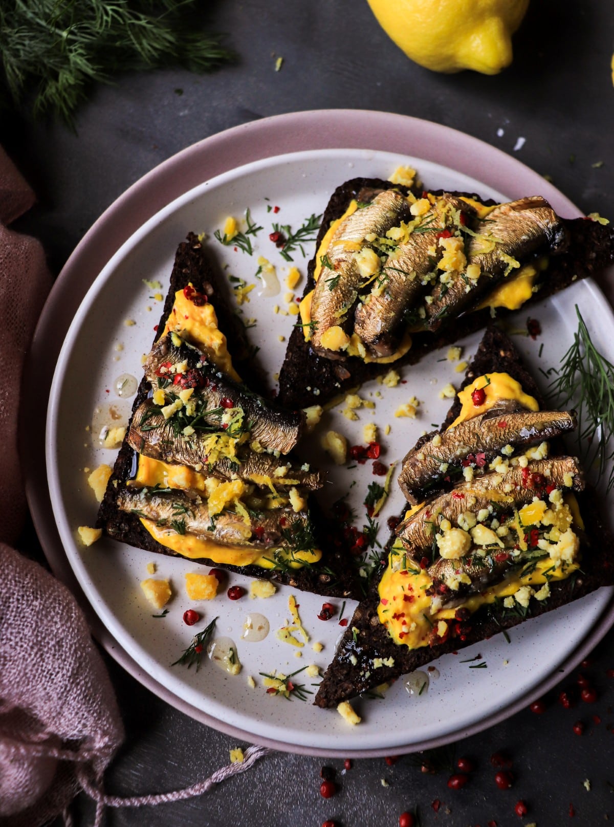 Scandinavian-inspired rye with smoked sprats and saffron egg