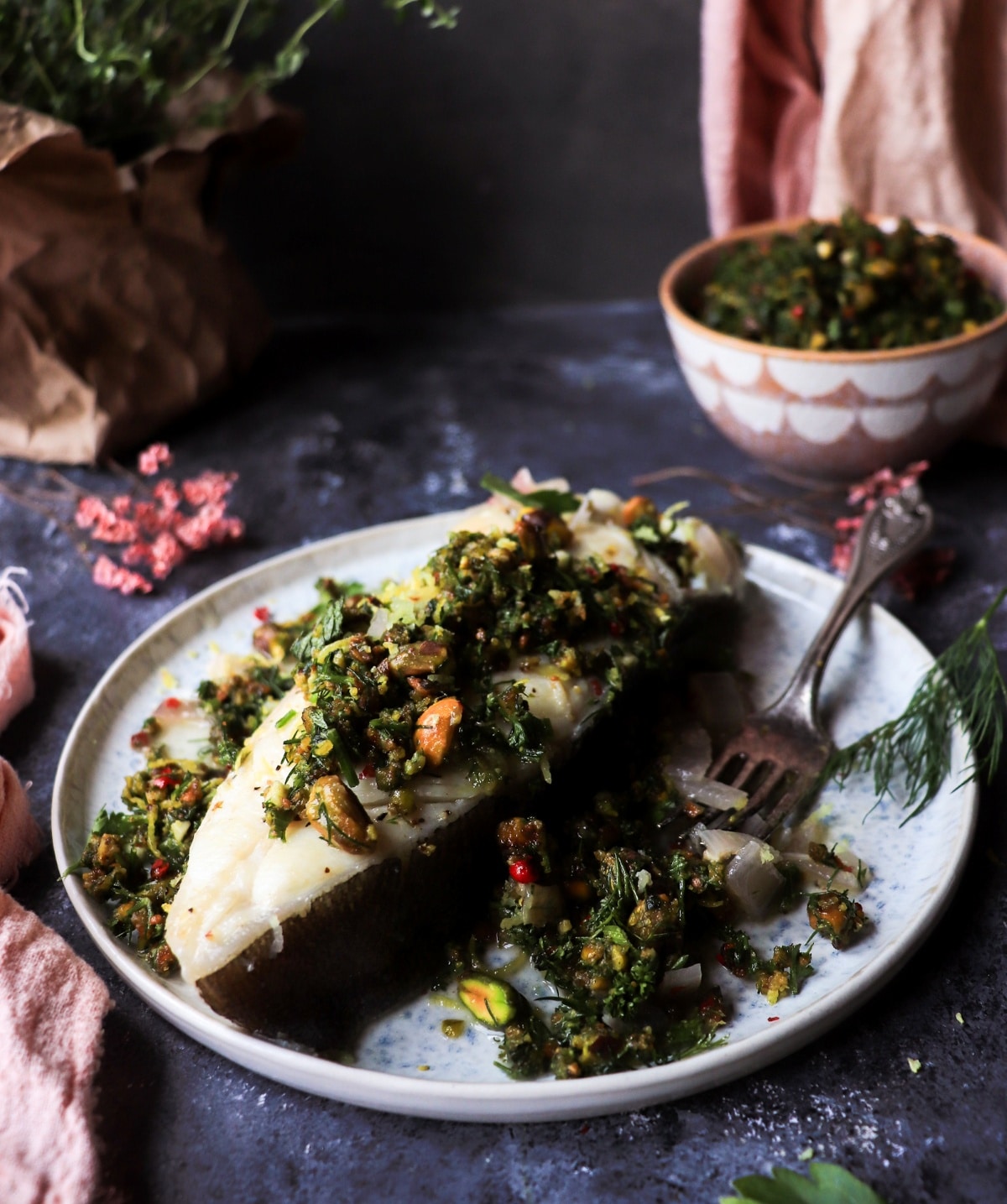 Mediterranean-inspired white wine halibut with lemon and pistachios.