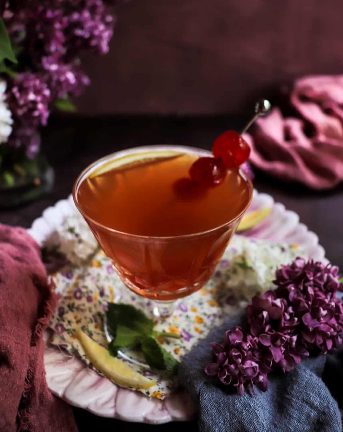 Cherry Orange Gin Cocktail with fresh lemon and cherries