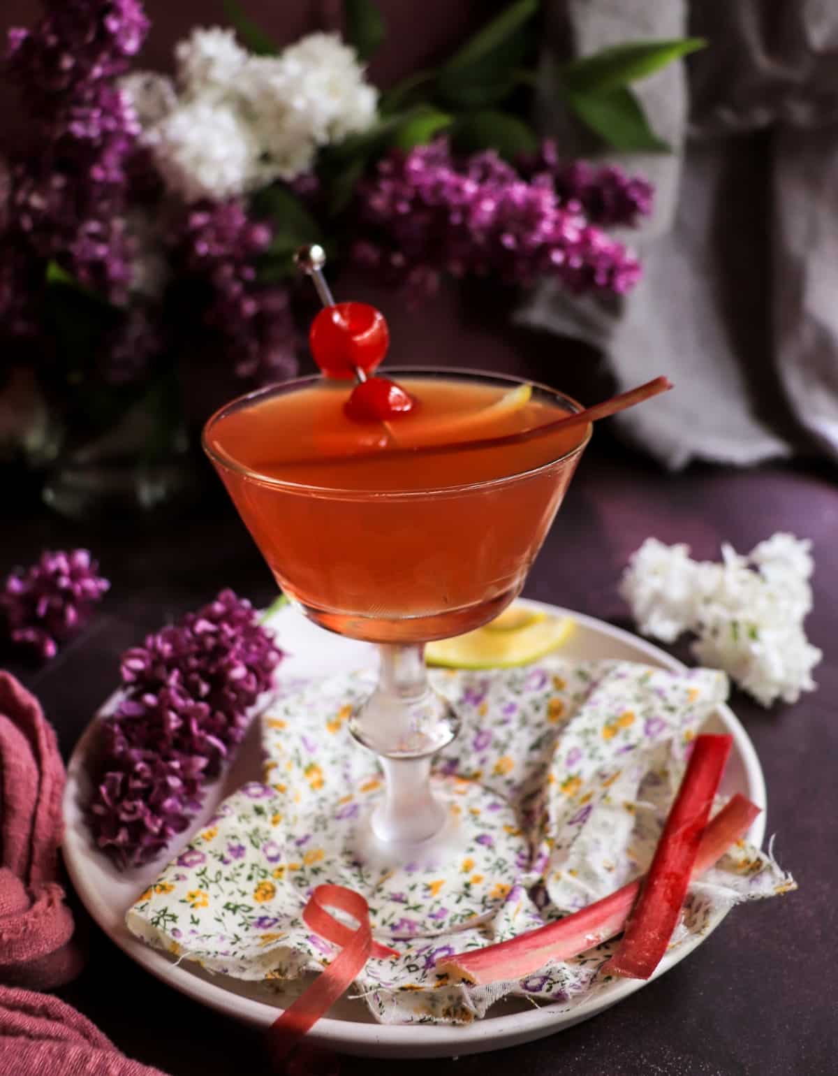 Cherry Rhubarb Gin Sour recipe with rhubarb syrup, cherry liqueur, and Empress 1908 Gin