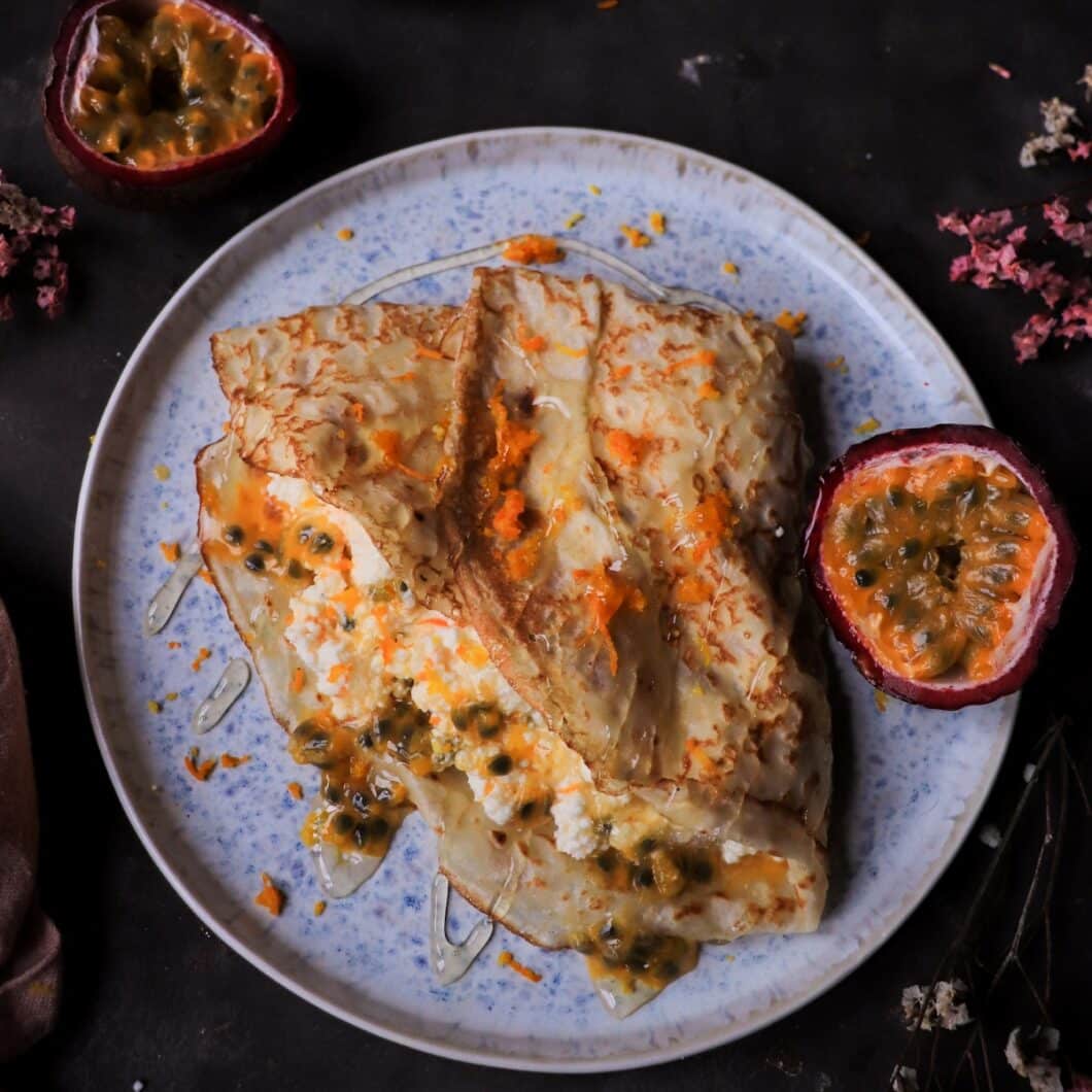 Orange Ricotta Crêpes with Passion Fruit