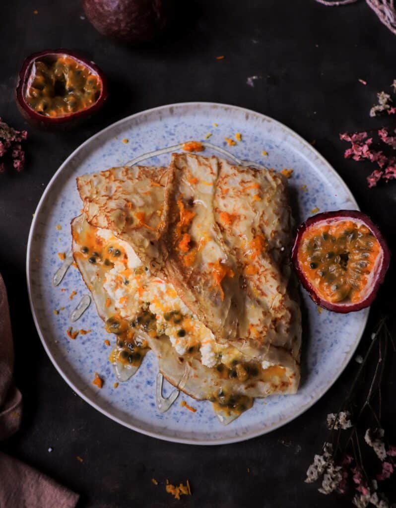 Orange Ricotta Crêpes with Passion Fruit