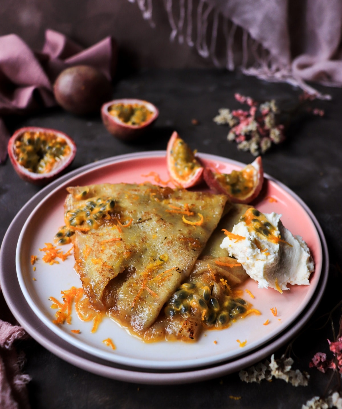 Crêpes Suzette with passion fruit, mascarpone and orange zest