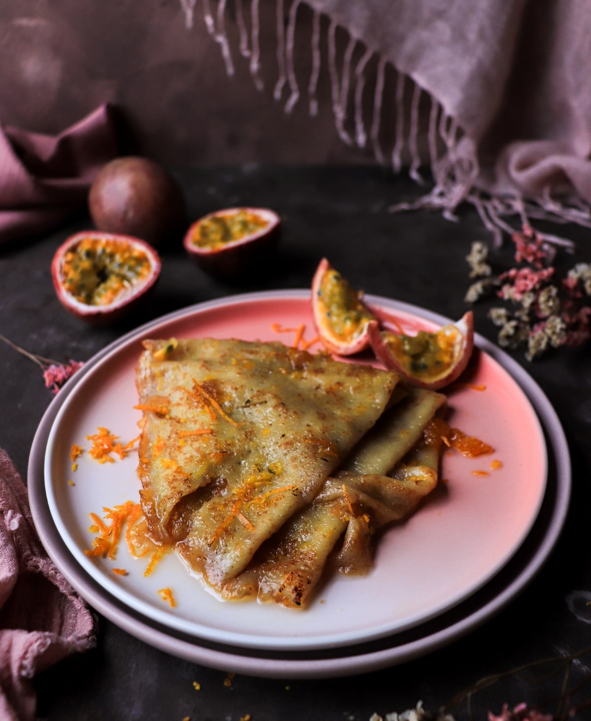 Caramelized orange crêpes with passion fruit