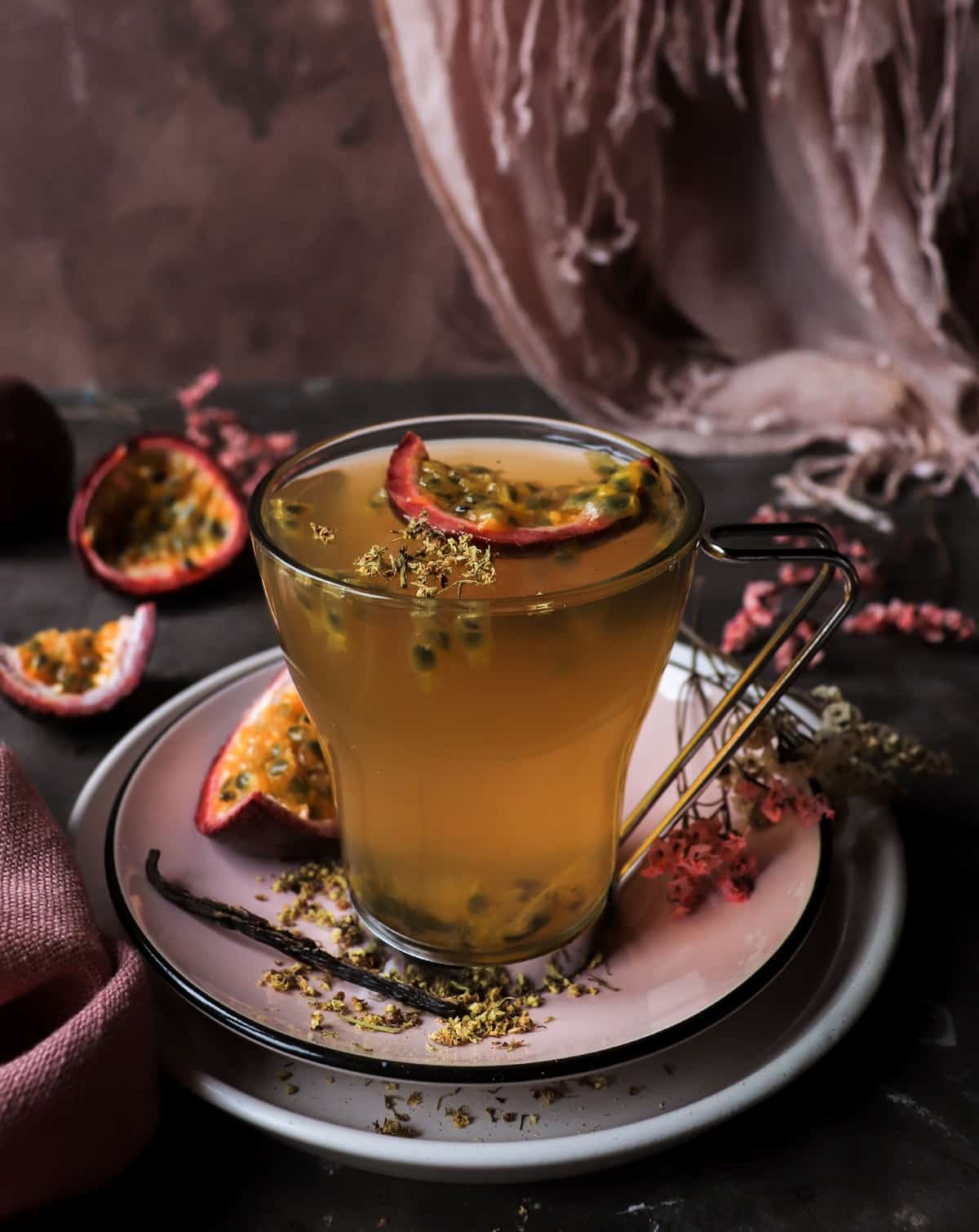 Homemade elderflower tea with passion fruit and honey